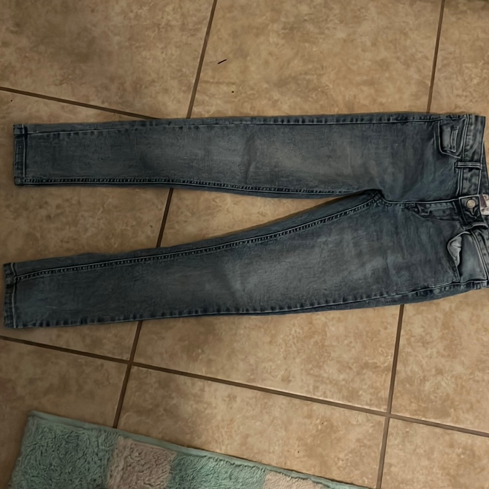 Skinny leg worn once runs small.